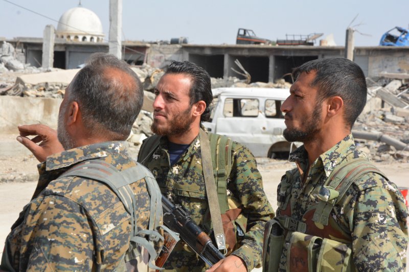 Syrian Democratic Forces, pictured here in Raqqa in 2017, evacuated 3,000 people this week from what's believed to be the Islamic State's final enclave in east Syria. File Photo by Youssef Rabih Youssef/EPA-EFE