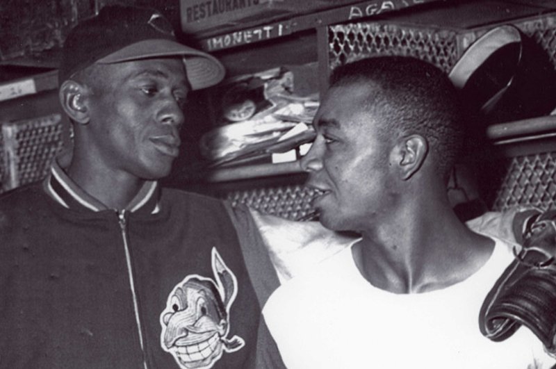 Larry Doby (R), shown with fellow former Negro Leagues baseball star Satchel Paige, was one of several players in the league who had attended one of the historically black colleges and universities. Photo courtesy of the Negro Leagues Baseball Museum