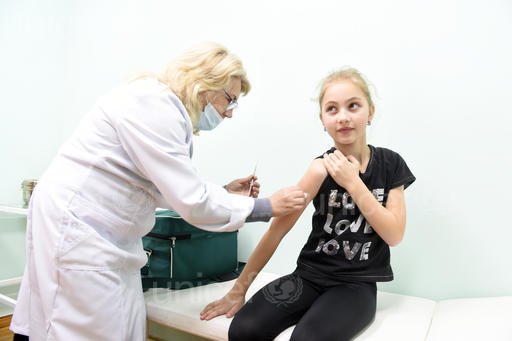 A girl in Lapaivka village, Ukraine, is vaccinated against measles during an epidemic in her country that has seen over 25,000 people fall ill to the disease in the first two months of this year. Photo by Yurko Dyachyshyn/UNICEF