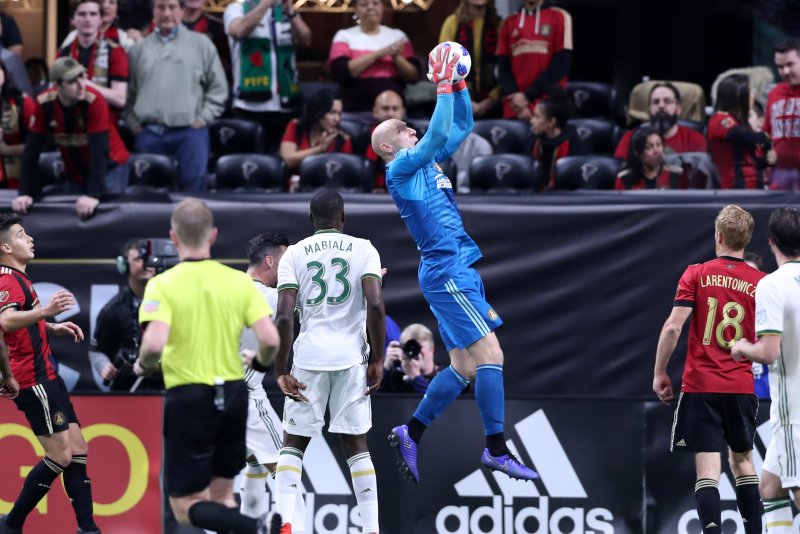 MLS players like Atlanta United FC goalie Brad Guzan (C) would receive salary reductions this year as part of the players' latest proposal to team owners for a modified 2020 season. Photo courtesy of Atlanta United FC.