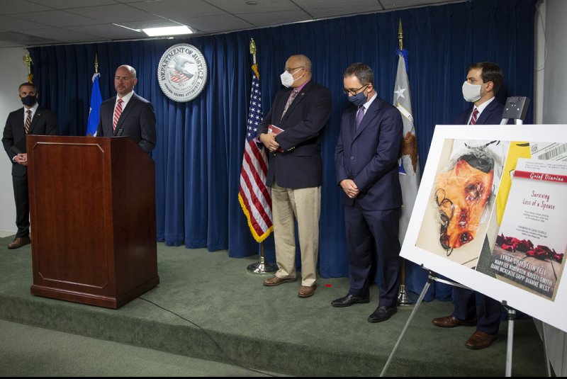 U.S. District Attorney for Massachusetts Andrew E. Lelling announces charges of conspiracy to commit cyberstalking and witness tampering against six former eBay executives in June 2020. Photo by CJ Gunther/EPA-EFE