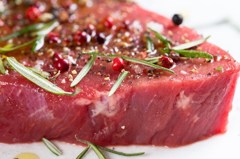 A new survey shows people in the United States are reducing the amount of red and processed meats they eat. Photo by gate74/<a class="tpstyle" href="https://pixabay.com/en/meat-beef-raw-marinated-steak-2602031/">Pixabay</a>