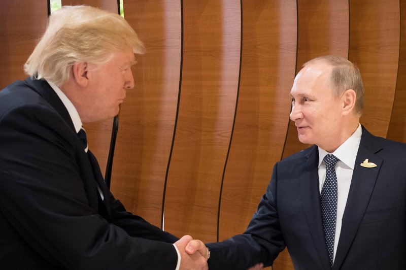 An aide to Russian President Vladimir Putin says the Kremlin isn't interested in playing regional games with Washington. Photo courtesy of SteffenKugler/EPA