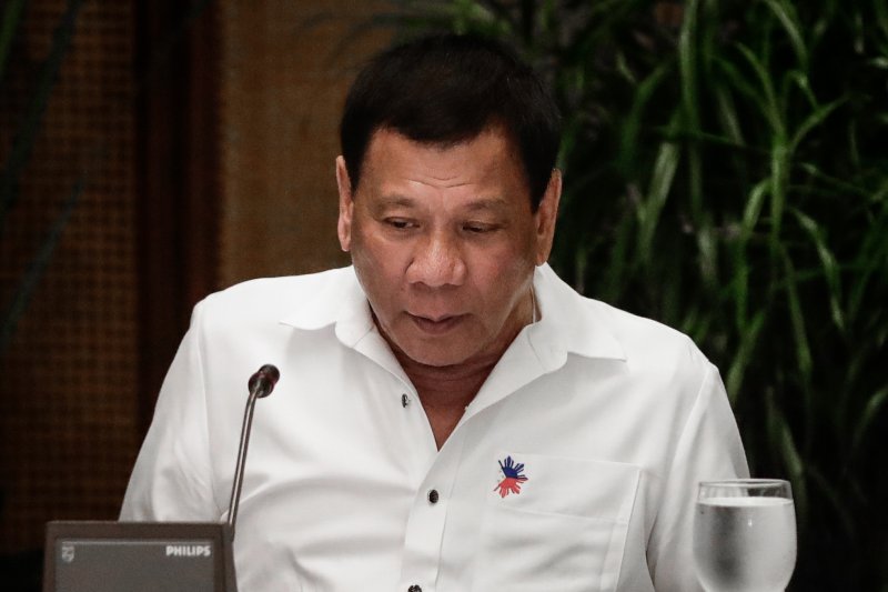 Philippine President Rodrigo Duterte told reporters Thursday he ordered troops to occupy disputed territory in the South China Sea. File Photo by Mark R. Cristino/EPA