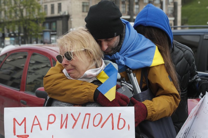 Dozens of Ukrainian civilians evacuated from Mariupol