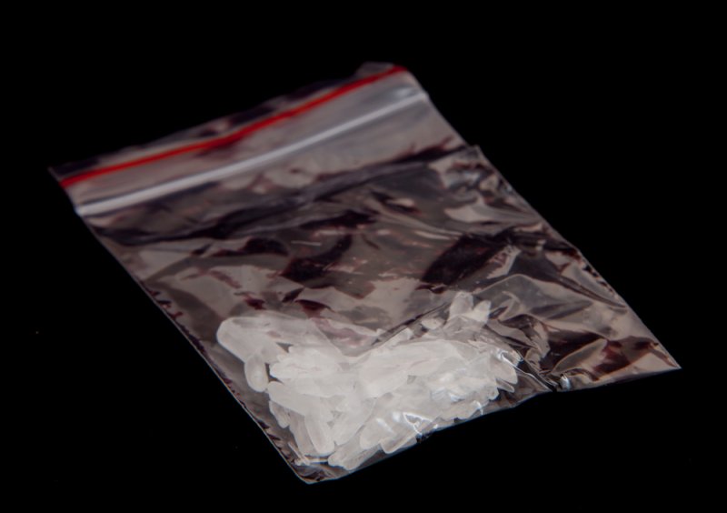 An Indiana woman was arrested after allegedly sending a text message to a police officer with an offer to sell crystal meth. Photo by Kaesler Media/Shutterstock.com