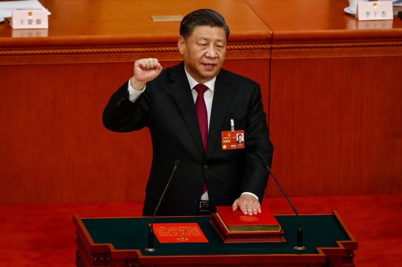 Chinese President Xi Jinping takes his oath during the Third Plenary Session of the National People's Congress at the Great Hall of the People in Beijing on March 10. The Communist Party of China created two commissions to tighten its control under Xi. Photo by Mark Cristino/EPA-EFE