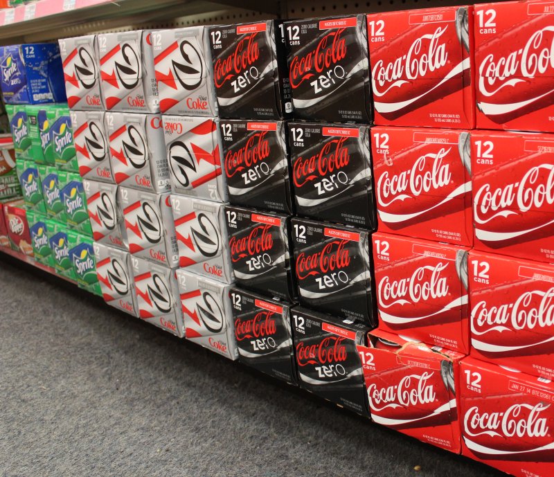 Children who consume ultra-processed foods, such as soft drinks, see extra weight-gain effects into adulthood, a new study has found. File Photo by Billie Jean Shaw/UPI