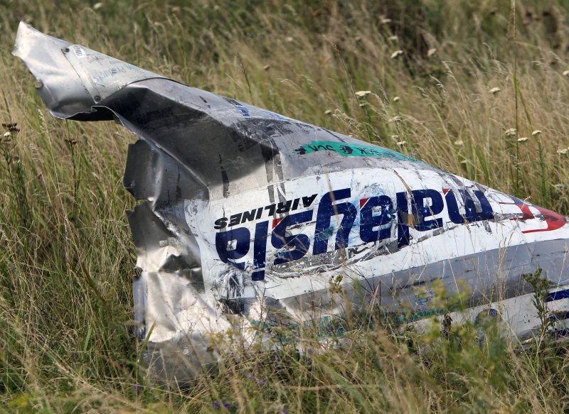 Part of the wreckage of MH17 is seen at the main crash site near Grabovo, Ukraine, east of Donetsk on July 20, 2014. File Photo by Igor Kovalenko/EPA-EFE