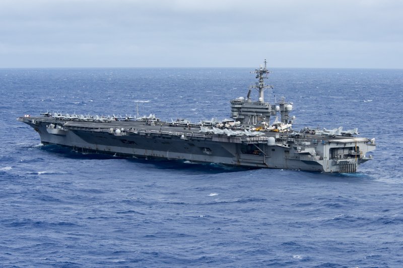 The aircraft carrier USS Carl Vinson travels in the the Philippine Sea on February 17. The ship is taking part in joint military drills with South Korea, starting Wednesday. Photo by Kurtis A. Hatcher/U.S. Navy