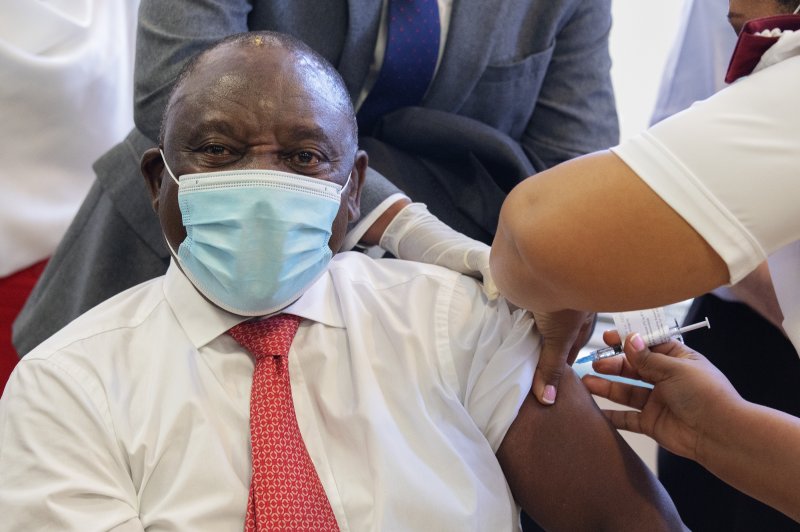 South African President Cyril Ramaphosa receives the Johnson &amp; Johnson coronavirus vaccine in Cape Town on Wednesday as the nation begins a rollout. Photo by Gianluigi Guercia/EPA-EFE/pool