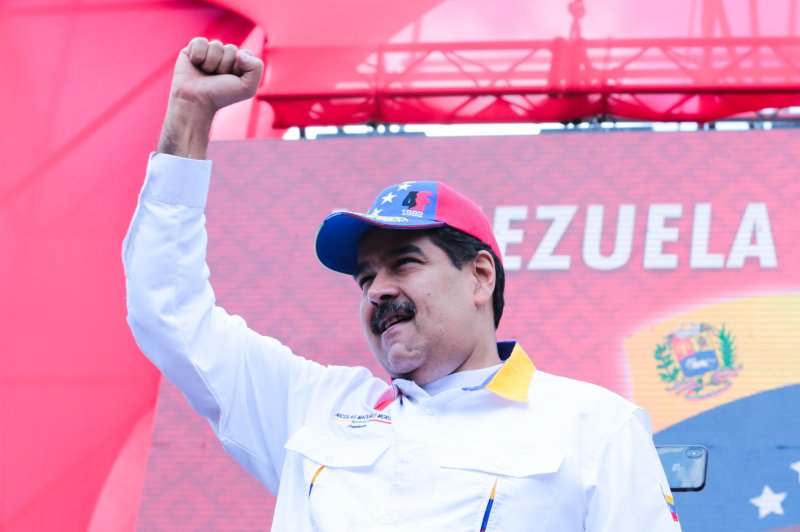 Venezuelan President Nicolas Maduro as he welcomes supporters participating in an 'anti-imperialist' protest, at the Miraflores Palace, in Caracas, Venezuela, 23 March 2019. Photo EPA-EFE/Prensa Miraflores