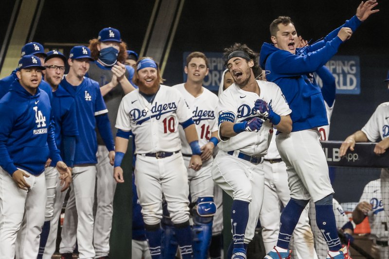 Los Angeles Dodgers center fielder Cody Bellinger (35) celebrates after hitting a home run during the seventh inning in Game 7 of the National League Championship Series on Sunday night at Globe Life Field in Arlington, Texas. Photo by Tannen Maury/EPA-EFE