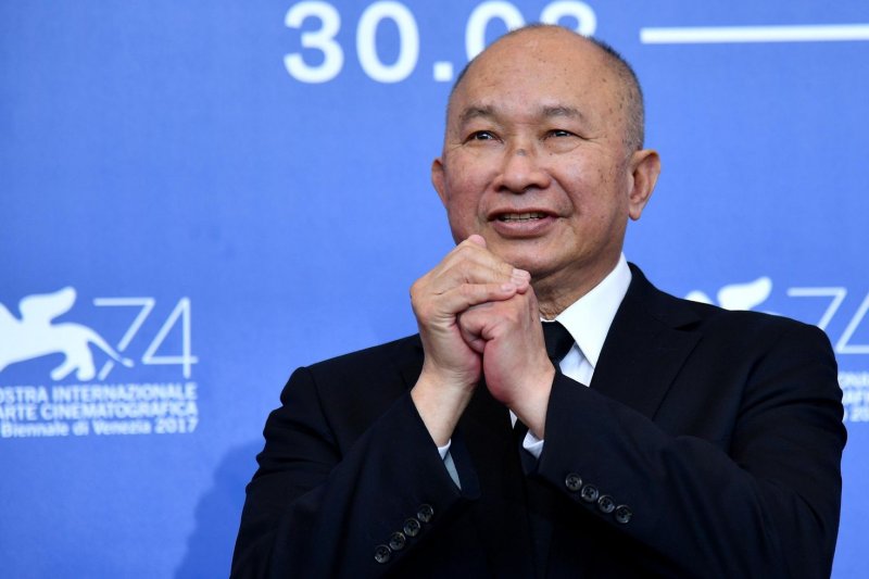 Chinese film director John Woo, pictured here in 2017, pioneered "bullet ballet" gun sequences in Hong Kong films. He directed the upcoming film "Silent Night" with producer Basil Iwanyk, who also produces the John Wick films, a series that Woo praises. File Photo by Ettore Ferrari/EPA-EFE