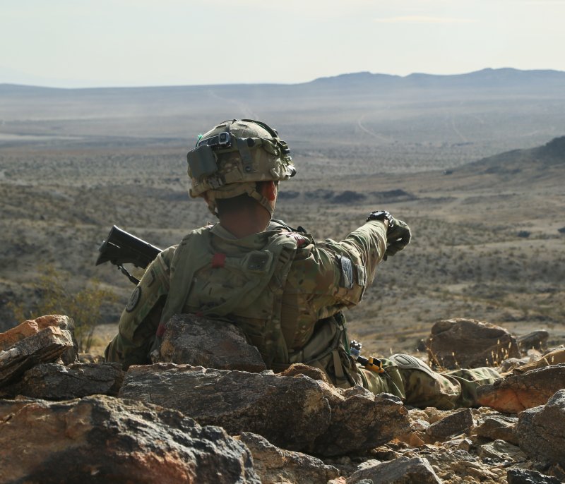 A U.S. Soldier assigned to 2nd Platoon “Bandit Troop”, 1st Squadron, 3rd Cavalry Regiment, scans for simulated enemies at a observation post during Decisive Action Rotation 18-04 at the National Training Center in Fort Irwin, Calif., Feb. 10, 2018. Photo by Spc. Esmeralda Cervantes/Operations Group/National Training Center/U.S. Army