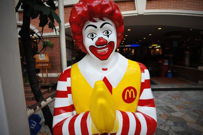 A Ronald McDonald statue in front of a Bangkok, Thailand, McDonald's restaurant. Photo by 1000 Words/Shutterstock