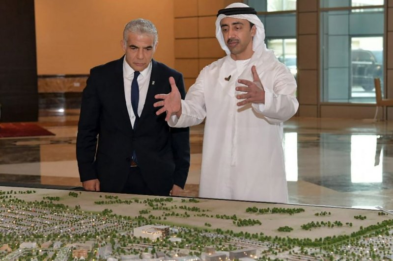 UAE Foreign Affairs Minister Sheikh Abdullah bin Zayed bin Sultan al-Nahyan (R) speaks with his Israeli counterpart, Yair Lapid, during their meeting in Abu Dhabi, United Arab Emirates, on Tuesday. Photo courtesy of the Israeli Government Press Office/EPA-EFE