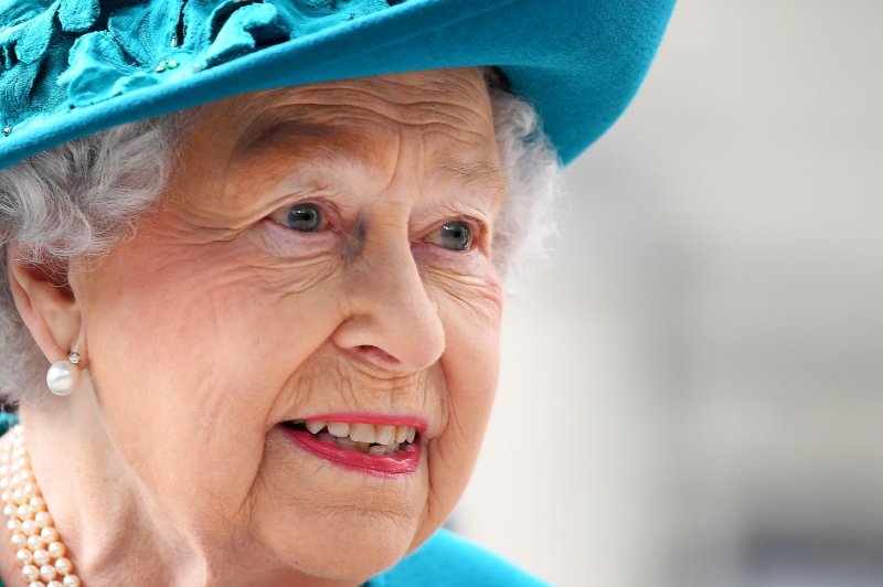 Queen Elizabeth II all smiles at first public appearance in two months