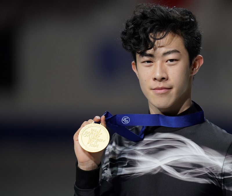 Men's figure skating gold medalist Nathan Chen of the United States poses with his medal at the 2019 ISU World Figure Skating Championships in Saitama, Japan, on March 23. Photo by Franck Robichon/EPA-EFE