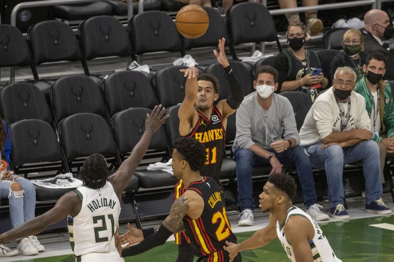 Atlanta Hawks guard Trae Young (11), shown during Game 2 of the Eastern Conference Finals on Friday, injured his ankle during Sunday's Game 3 of the series. Photo by Tannen Maury/EPA-EFE