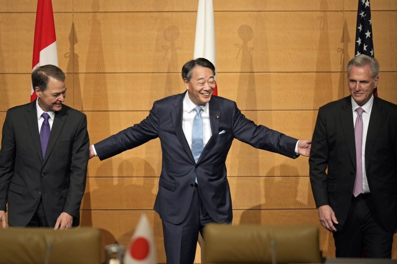 Anthony Rota (L) is welcomed by Banri Kaieda (C), vice speaker of Japan’s House of Representatives, along with U.S. House Speaker Kevin McCarthy (R) at the first session of the G7 Speakers' Meeting in Tokyo earlier this month. File Photo by Franck Robichon/EPA-EFE