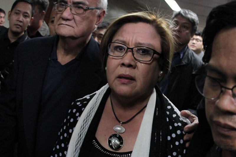 Sen. Leila de Lima (C) leaves the Philippine Senate in Pasay City, Philippines, on February 23, 2017, after she was arrested. Her bail before her trial was denied on Wednesday. File Photo by Joseph Vidal/Philippine Senate Public Relations and information bureau