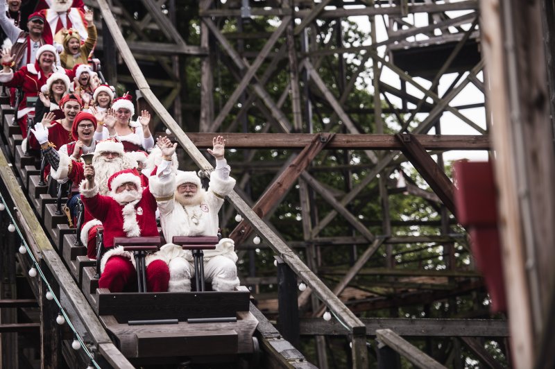 Hundreds of Santas from around the world gathered at Bakken amusement park in Denmark for the annual World Santa Claus Congress. Costumed guests are granted free admission to ride roller coasters, participate in parades and exchange experiences with Santas from other countries. Photo by Sarah Christine Noergaard/EPA