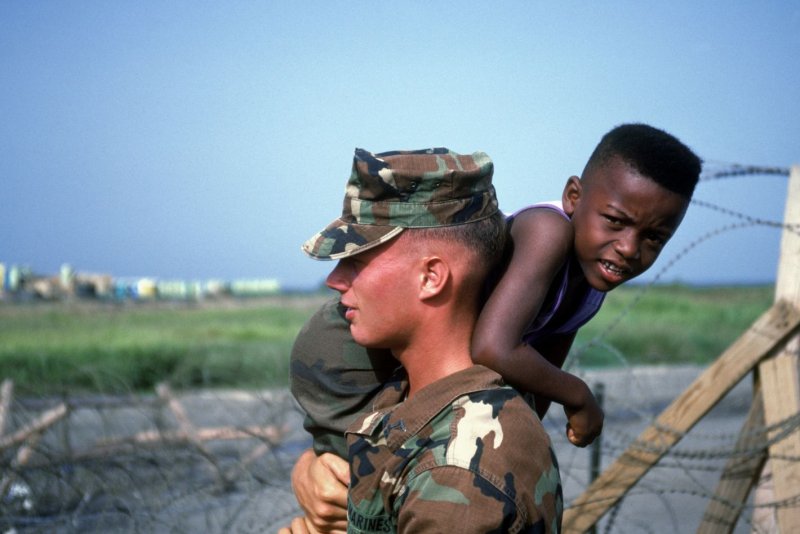 On This Day: Bush policy allows immediate return of Haitian refugees