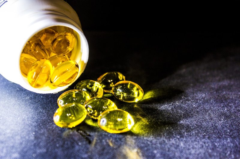 New research shows that vitamin D levels may play a role in whether a person is susceptible to COVID-19 and how severe a case they end up with if they get it. Photo by <a href="https://pixabay.com/photos/cure-drug-tablets-cod-liver-oil-2175323/">frolicsomepl</a>/Pixabay<br>