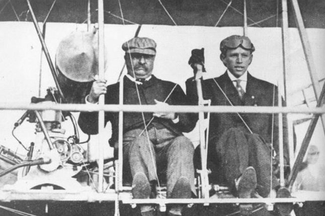 In this October 11, 1910 file photo Col. Theodore Roosevelt takes off from Aviation Field in St. Louis, Missouri with pilot Arch Hoxsey. Roosevelt described the trip as, "the bulliest experience I ever had." File/UPI