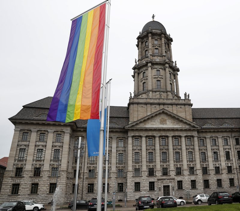 A rainbow flag hangs in front of a government building in Berlin, Germany. Wednesday, the government banned "conversion therapies" for persons under the age of 18. File Photo by Felipe Trueba/EPA-EFE