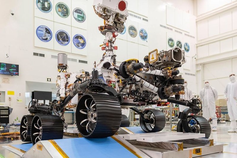 In a clean room at NASA's Jet Propulsion Laboratory in Pasadena, Calif., engineers observe the first driving test for NASA's Perseverance rover in December. File Photo courtesy of NASA