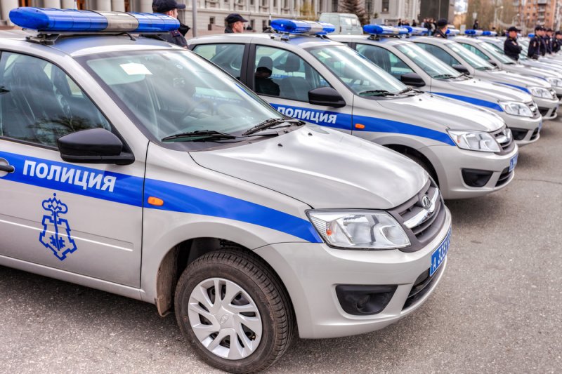 Russian police patrol vehicles parked on the Kuibyshev Square in Samara, Russia. Photo by FotograFFF/Shutterstock