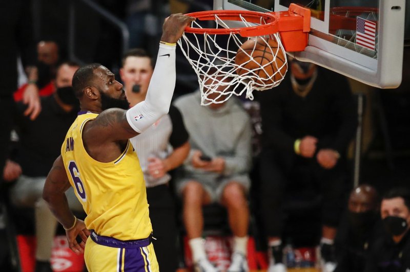 Forward LeBron James scored 14 points over the final 12 minutes to help the Los Angeles Lakers beat the Houston Rockets on Tuesday in Houston. Photo by Caroline Brehman/EPA-EFE