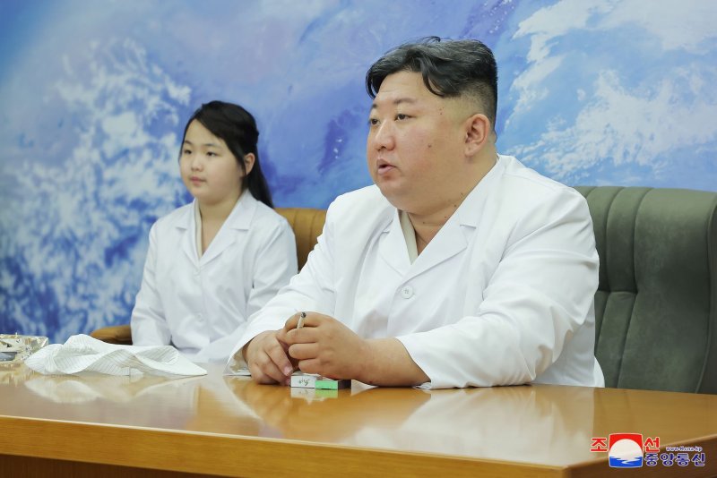 North Korean leader Kim Jong Un, accompanied by his daughter Ju Ae, reviewed the North's first completed military reconnaissance satellite and "approved the future action plan" for its launch, state-run KCNA reported Wednesday. Photo by KCNA/EPA-EFE