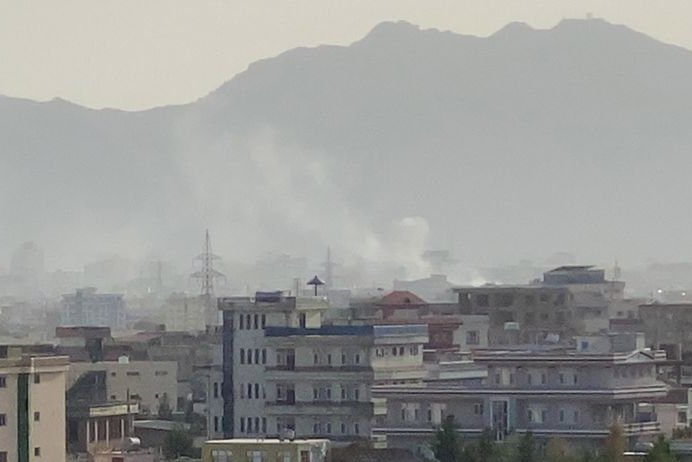 Smoke billows at the scene after an explosion near the Hamid Karzai International Airport, in Kabul, Afghanistan, on Sunday. Photo by EPA-EFE