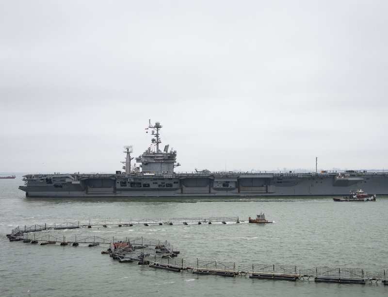 The aircraft carrier USS Harry S. Truman, pictured departing Naval Station Norfolk, will stay in the Mediterranean to reassure European allies instead of making a planned transit to the Middle East. Photo by Mass Communication Specialist 3rd Class Kaleb J. Sarten/U.S. Navy