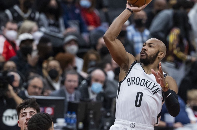 Former Brooklyn Nets guard Jevon Carter (0), shown Feb. 10 against the Washington Wizards, averaged 3.6 points over 12 minutes per game for the Nets this season. Photo by Jim Lo Scalzo/EPA-EFE