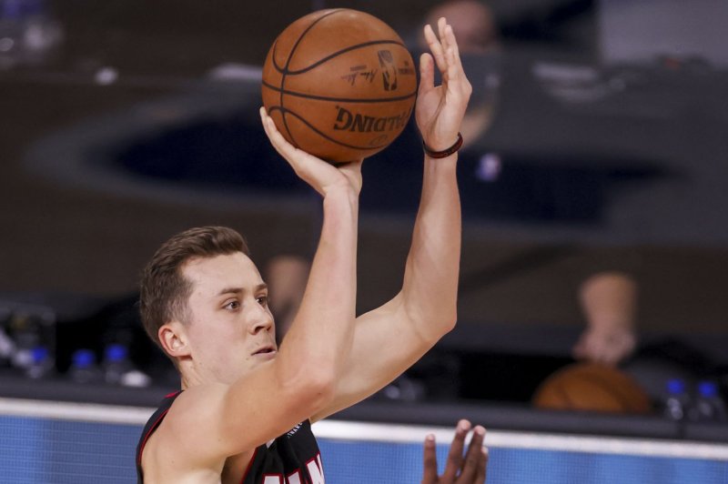 Duncan Robinson (L) made seven 3-pointers in a Miami Heat win over the New York Knicks on Wednesday in Miami. Photo by Erik S. Lesser/EPA-EFE