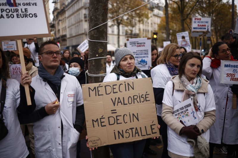 Hundreds of French health workers have been calling for better working conditions in recent months, and were taking part in a nationwide strike to protest a government plan to overhaul the country's pension system. File photo by Yoan Valat/EPA-EFE