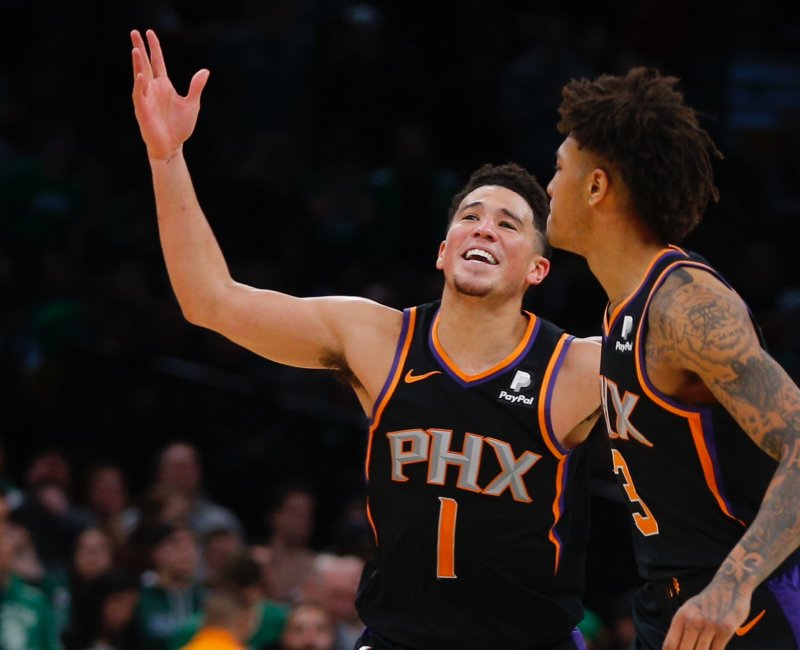 Phoenix Suns guard Devin Booker (L) had 14 points in a loss to the Minnesota Timberwolves on Tuesday in Phoenix. Photo by C.J. Gunther/EPA-EFE