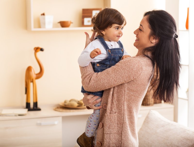Children learn language faster than adults because of the way that parents talk to them, according to new research. File Photo by Solis Images/Shutterstock