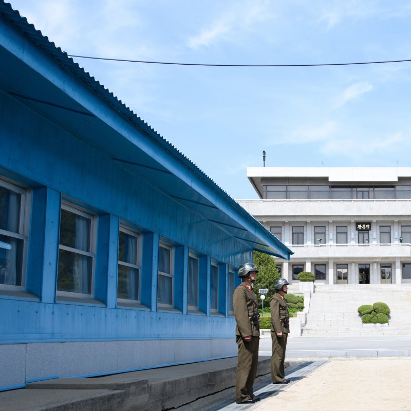 North Korean soldiers stand guard Thursday at the Joint Security Area on the Demilitarized Zone in the border village of Panmunjom in Paju, South Korea. The Inter-Korean summit will take place in the truce village Friday. Photo by Korea Summit Press/EPA-EFE/Pool