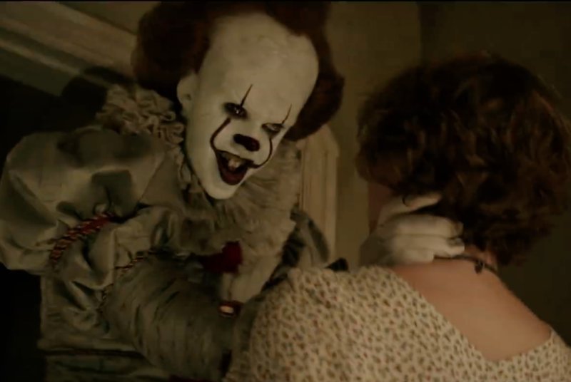 The child-eating clown monster Pennywise is shown in a scene from the horror film "It." File image courtesy Warner Bros.