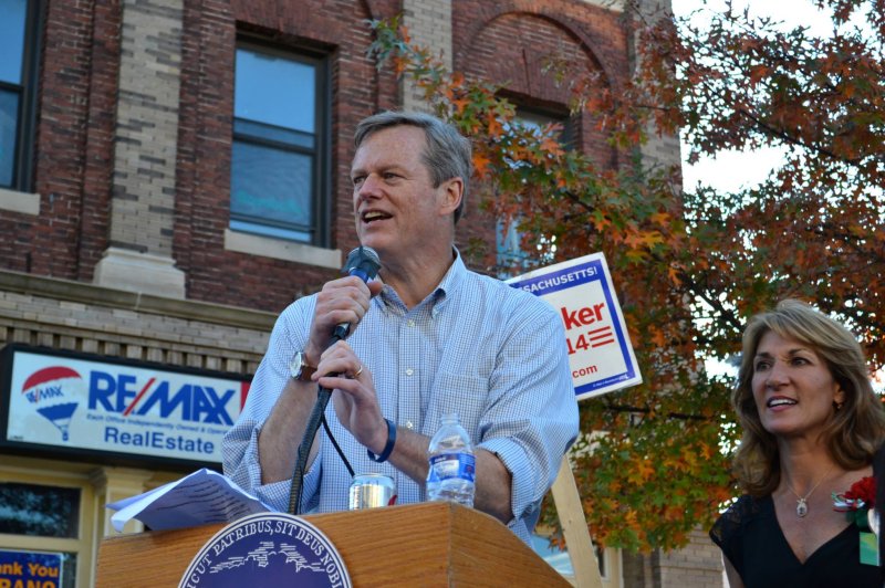 Massachusetts Gov. Charlie Baker, shown at a campaign rally in 2014, is considering a sweeping clean energy bill passed by the state legislature Monday. Photo courtesy of Facebook/UPI