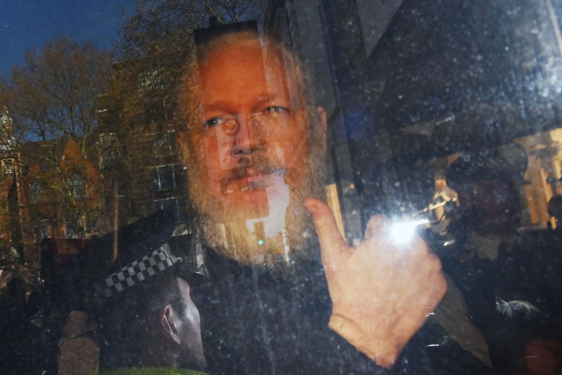 Wikileaks co-founder Julian Assange arrives at Westminster Magistrates Court in London, Britain, on April 11 after he was arrested at the Ecuadorian Embassy. File Photo by EPA-EFE
