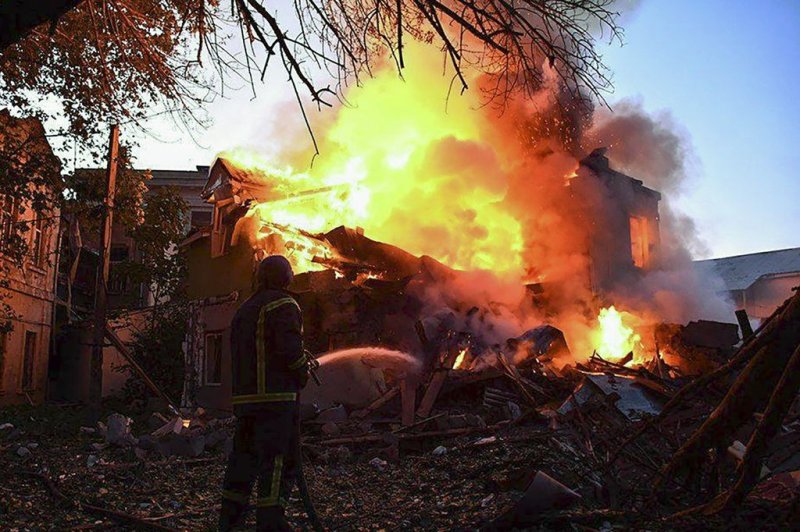 A fire is seen at a residential building after a Russian strike near Mykolaiv in southern Ukraine on Tuesday. Photo courtesy of State Emergency Service of Ukraine/EPA-EFE