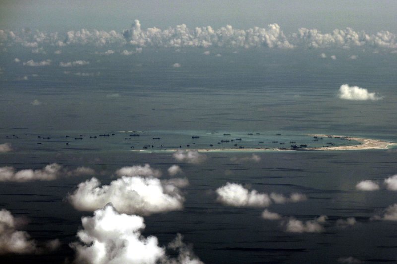 A file picture dated May 11, 2015, shows an areal view of alleged artificial islands built by China in disputed waters in the South China Sea, west of Palawan, Philippines. Photo by Ritchie B. Tongo/EPA