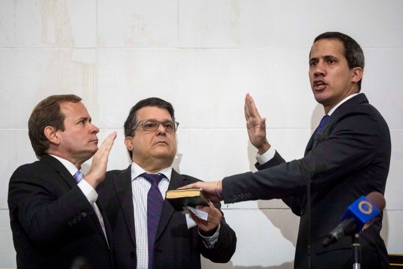 Venezuelan opposition leader Juan Guaido was sworn in as the head of the country's National Assembly after he stormed the parliamentary building with supporters on Tuesday. Photo by Miguel Gutierrez/EPA-EFE