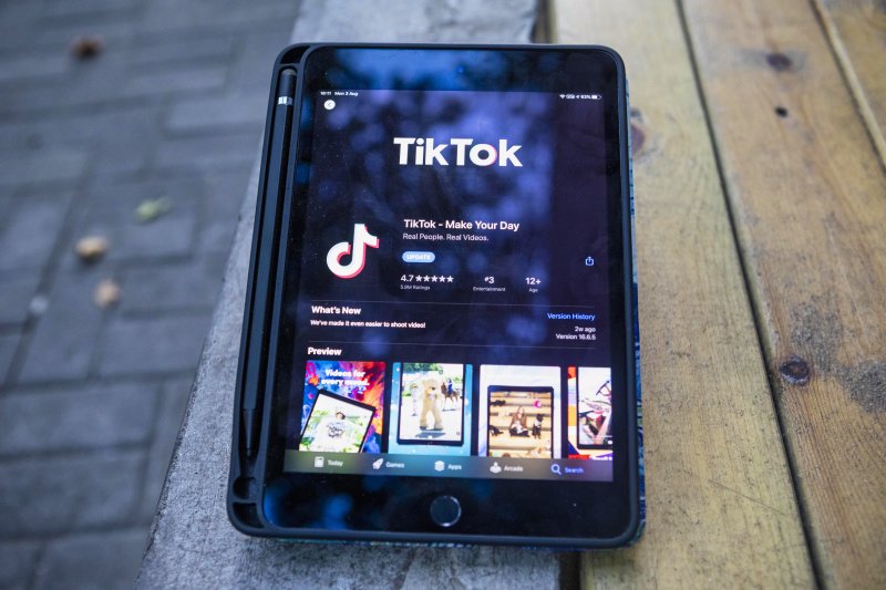 A TikTok app is seen on a tablet. File Photo by Alex Plaveski/EPA-EFE